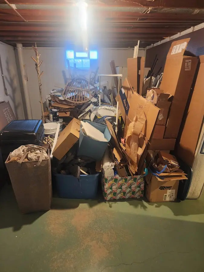 Roll-off dumpster container at job site for 2 Yard Dumpster Rental in Dover